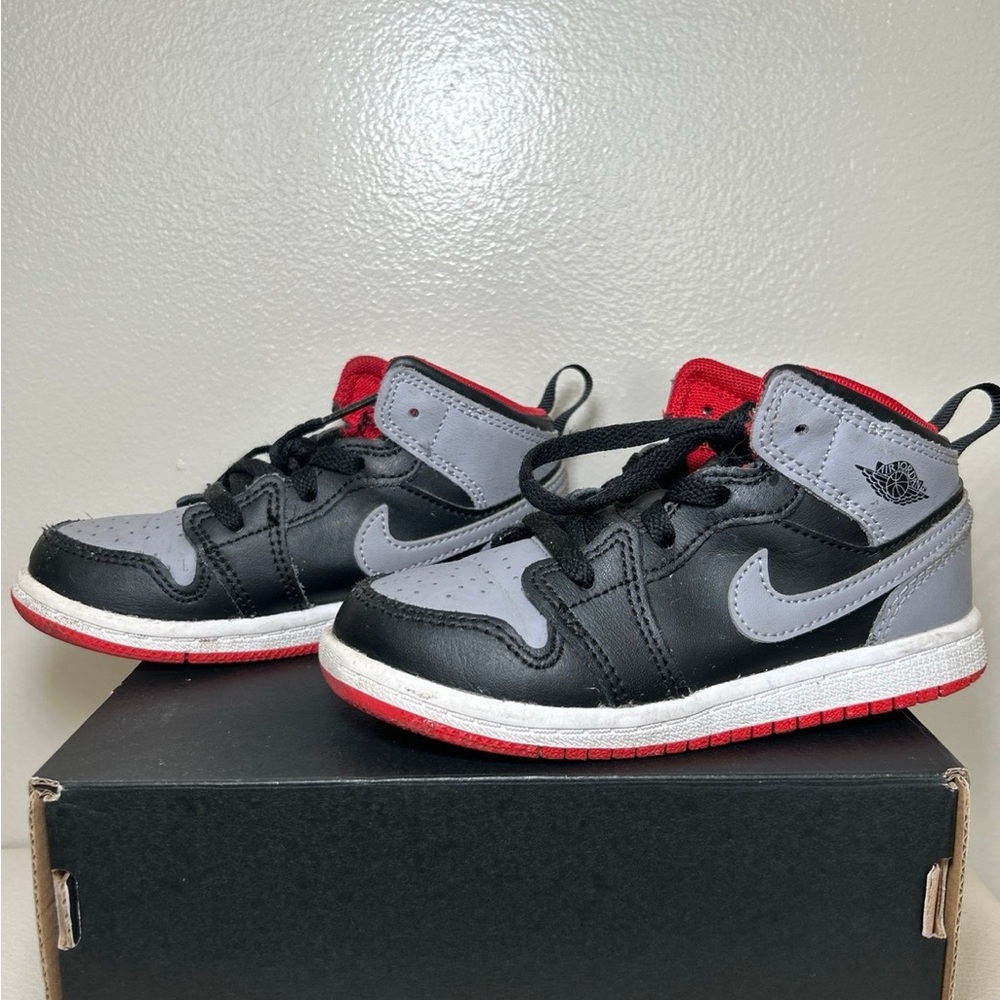 Nike Kids Black and Gray Sneakers with Red Accents